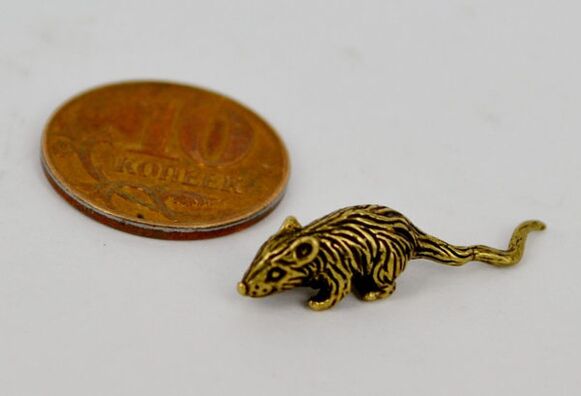 figurine of a mouse as a good luck amulet